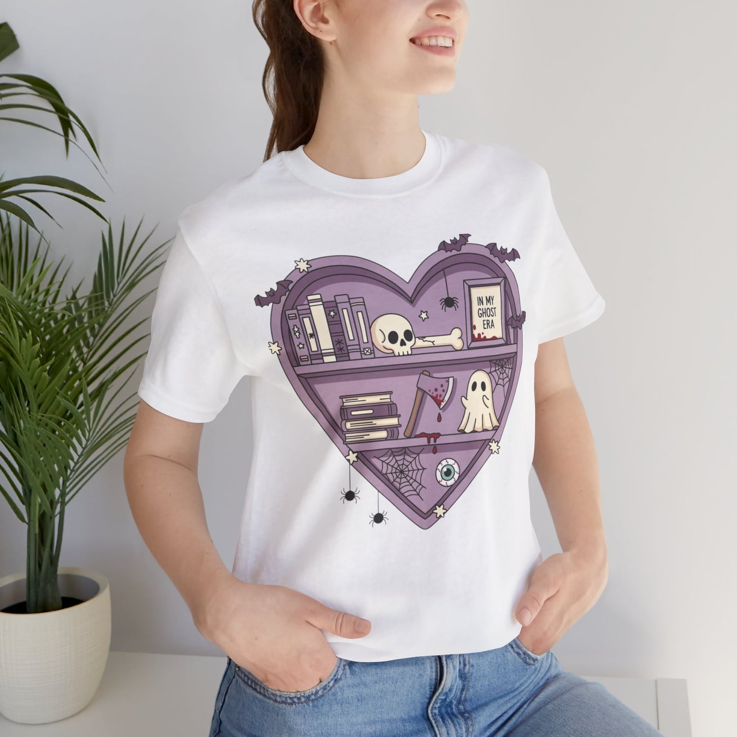 Heart-Shaped Ghostly Shelf Tee, Unisex Tee, Halloween Shirt, Fun Graphic Tee, Quirky Gift, Book Lover Apparel