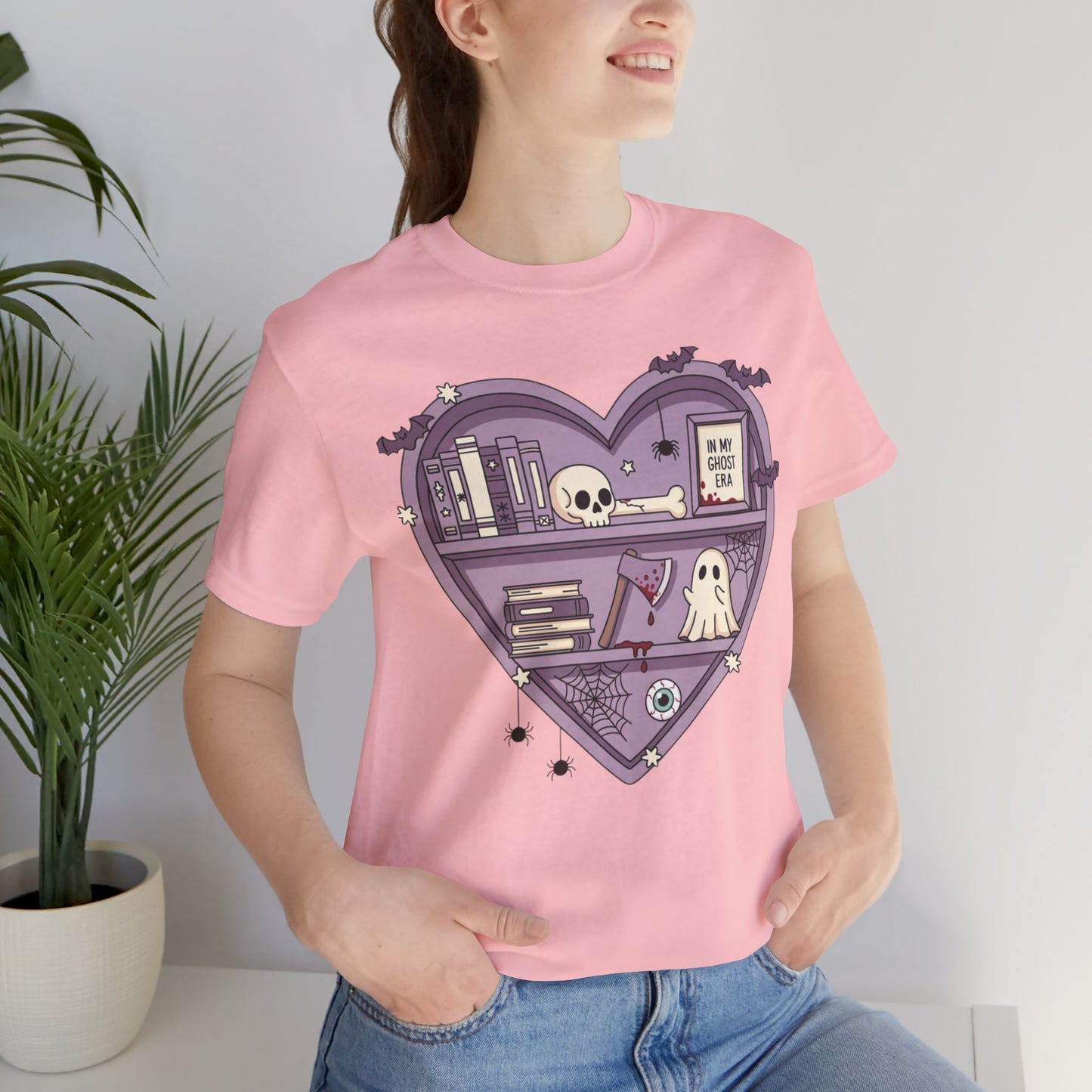 Heart-Shaped Ghostly Shelf Tee, Unisex Tee, Halloween Shirt, Fun Graphic Tee, Quirky Gift, Book Lover Apparel