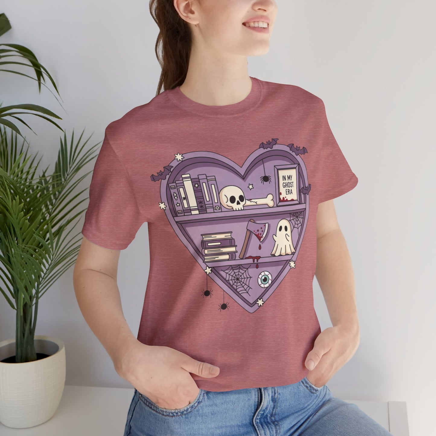 Heart-Shaped Ghostly Shelf Tee, Unisex Tee, Halloween Shirt, Fun Graphic Tee, Quirky Gift, Book Lover Apparel
